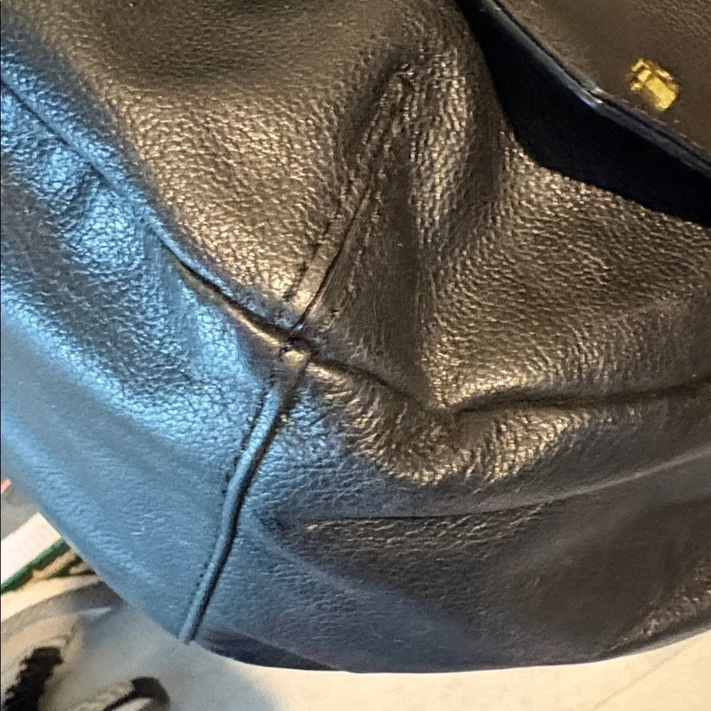 Elliott Lucca  shoulder bag  leather black  braiding & large tassel front  NWOT
